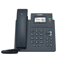 Load image into Gallery viewer, Yealink T31P IP Phone, 2 VoIP Accounts. 2.3-Inch Graphical Display. Dual-Port 10/100 Ethernet, 802.3af PoE, Power Adapter Not Included (SIP-T31P)
